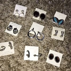 Lot 9    9 pairs of clip ons